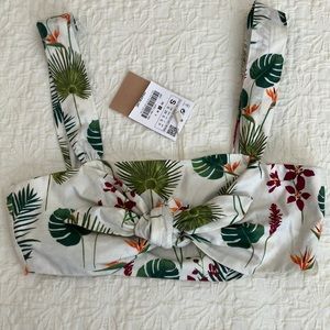 Fabulous summer print bustier with straps, front tie and side zip.